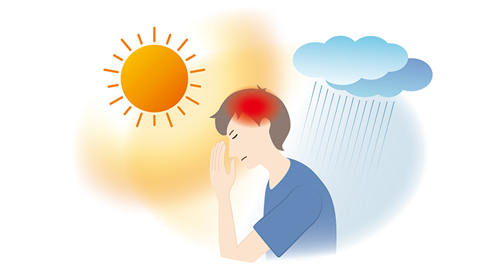 天気痛に苦しむ人のイラスト