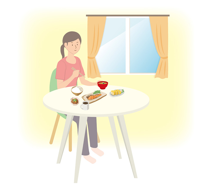 栄養バランスのよい食事を摂る女性